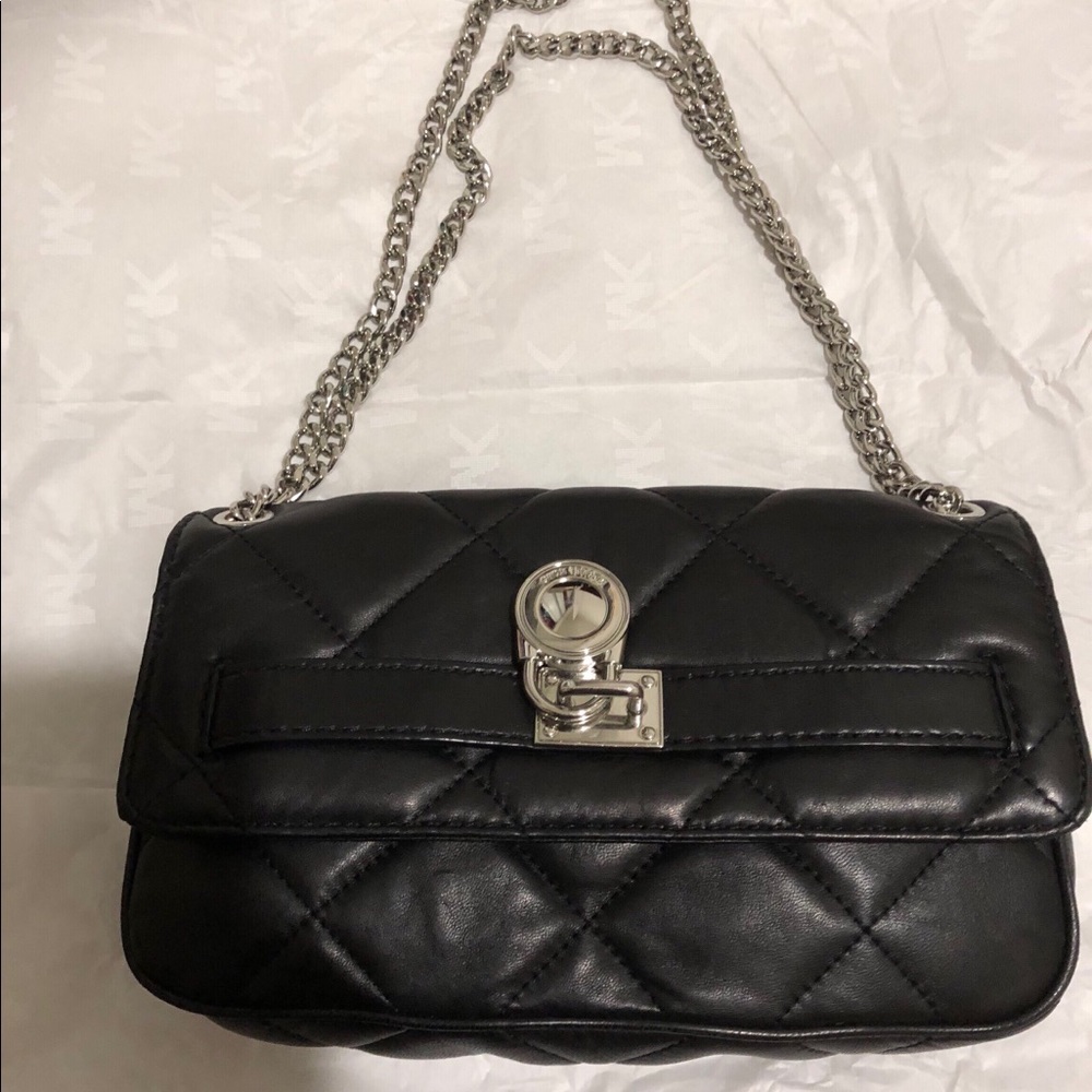 Hamilton quilted shoulder purse. Or can be clutch.